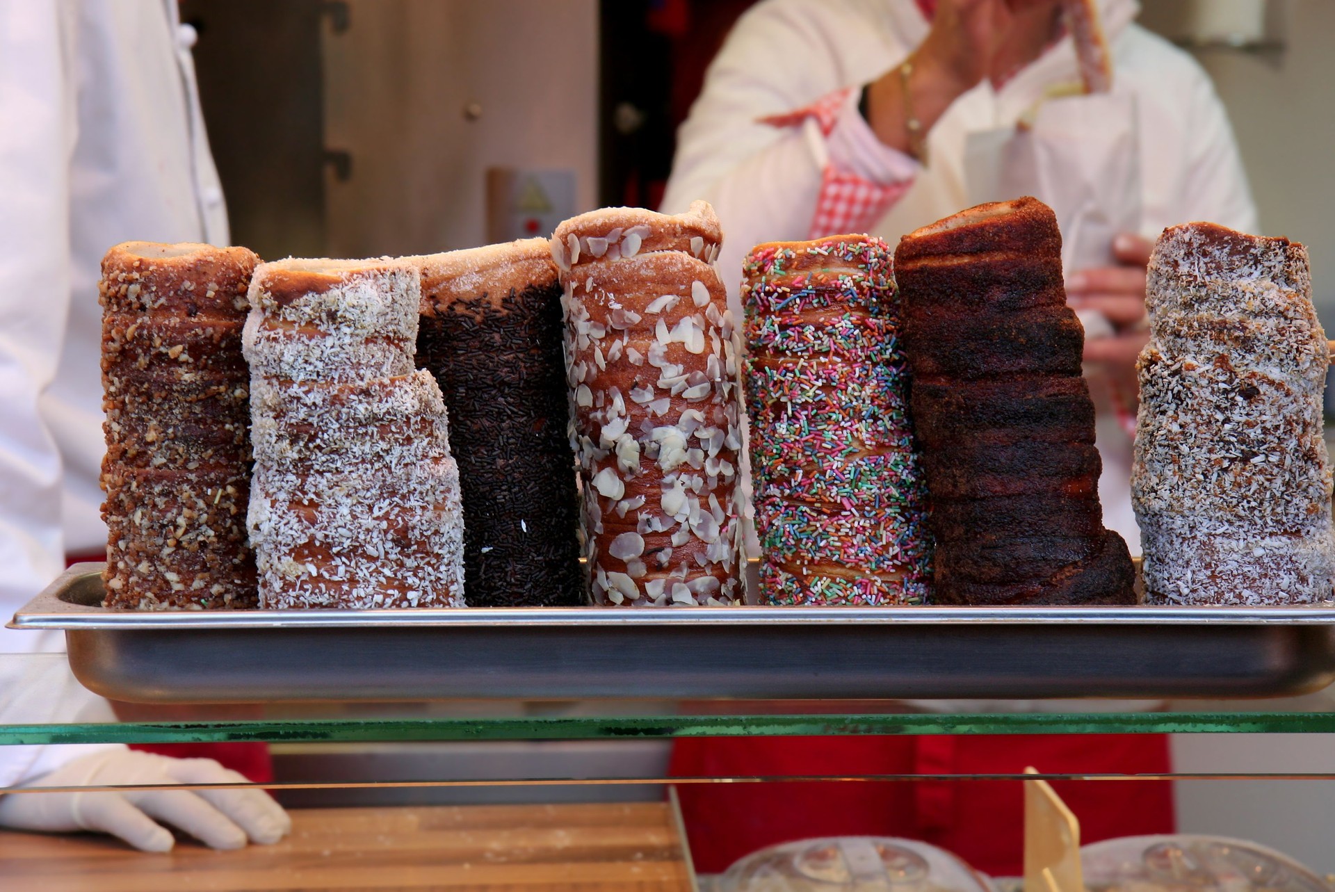 Unidentified People selling Trdelnik aka Chimney Cakes at Christmas Market in Frankfurt, Germany
